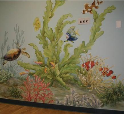 Our office features several hand-painted murals to create a fun, colorful environment.