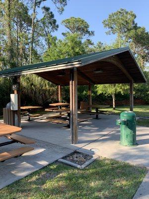 Pavilion with seating and grill