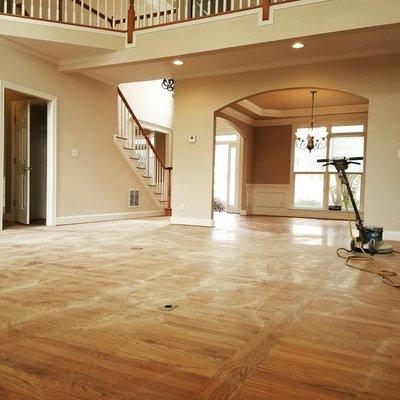 This is what an oak floor looks like before an application of polyurethane. Going be smooth as glass...