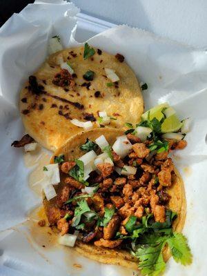 Pork pupusa and al pastor taco.