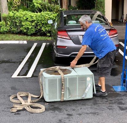 Xavier removing old  Rheem compressor