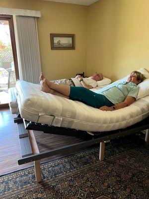 Two Adjustable Beds with standalone cross beams and feet