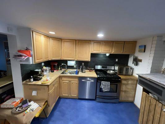 Before shot of a client's kitchen: They wanted something more clean-looking and minimal.