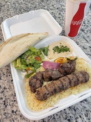 Combo #2 With beef and Lula Skewer, hummus and Greek salad