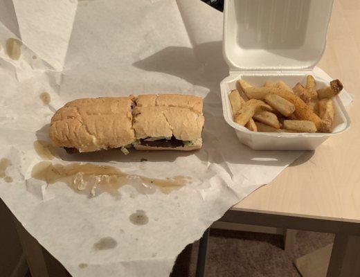 Hot sausage Po Boy with fries!!! Too Good