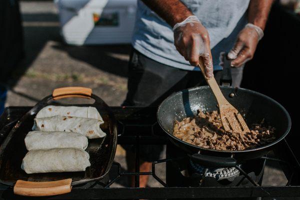 Preparing wraps at the Farmer's Market.