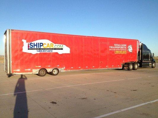 Our newest addition to our enclosed car shipping fleet is red!