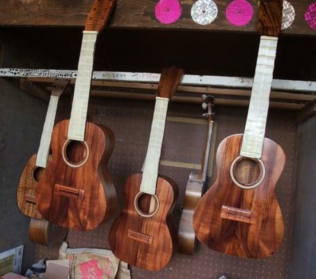 Custom koa ukuleles ready for final finishing.