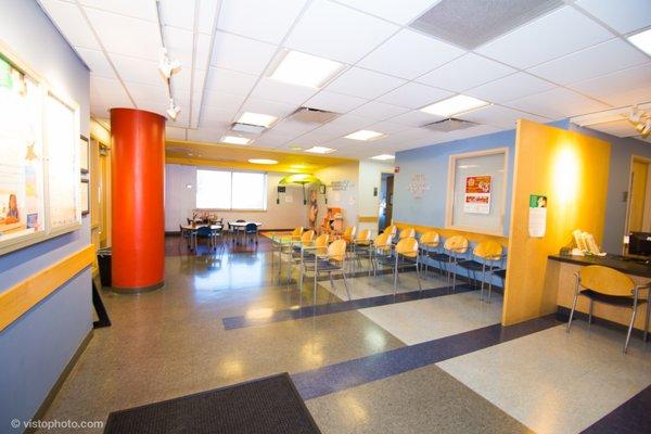 Medical clinic waiting area (full)- view from check-in desk.