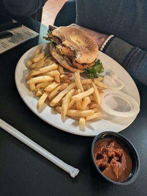 Salmon cake sandwich with fries