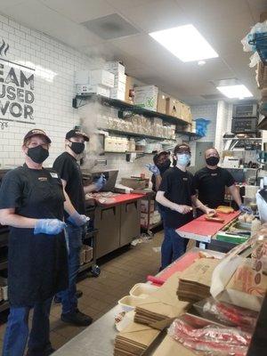 Kitchen staff at firehouse