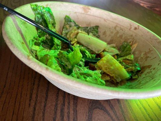 Caesar Salad bowl with BBQ chicken, Lemon Caesar sauce and crispy onions.