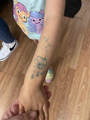 The owner drew tattoos for our nieces so they could be part of the Bee tribe.