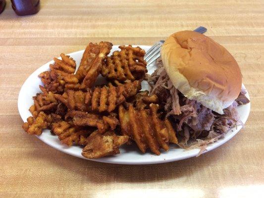 Pulled Pork Sandwich with Waffle Fries (also comes with a side of coleslaw or apple sauce)