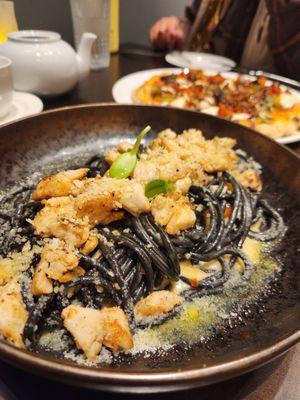 Squid ink pasta with crabs