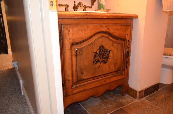 Laser etching on a bathroom cabinet