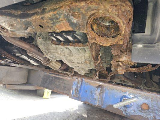 The entire subframe of the vehicle is rotted out entirely. Remeber, this was sold as safe and reliable.