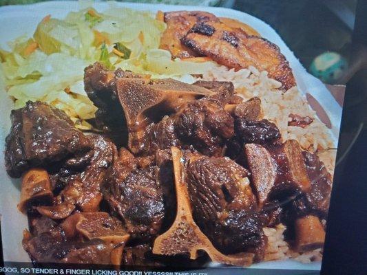 Oxtails, rice n peas, cabbage and plantains