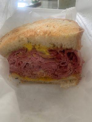 Corned beef on rye with Swiss