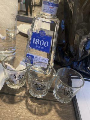 1800 tequila and 3 complimentary shot glasses