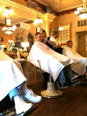 Customers at The Elite Barber Shop