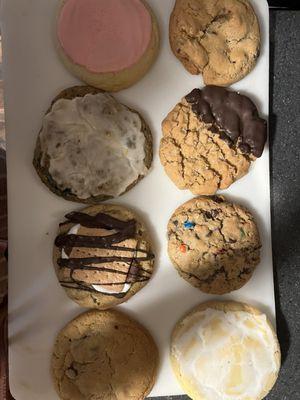 Almond glazed, turtle, blueberry oatmeal iced, peanut butter chocolate, smores, monster, chocolate chip, lemon snicker doodle.