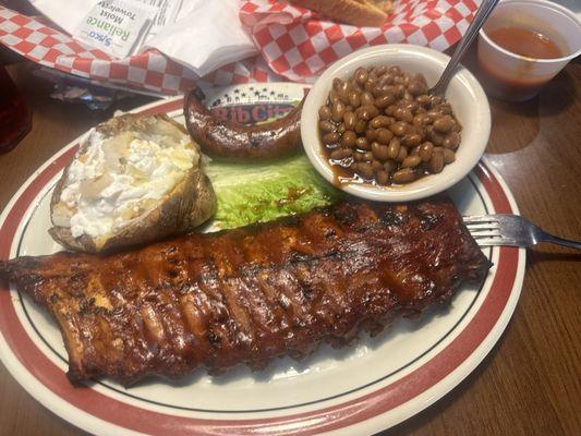 Full rack, smoked sausage, baked beans and loaded potato. Everything was ok average bbq fare.