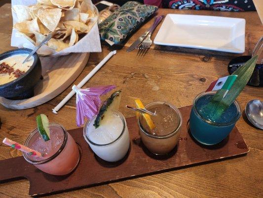 Overhead view of the margarita flight. Each one is decorated!