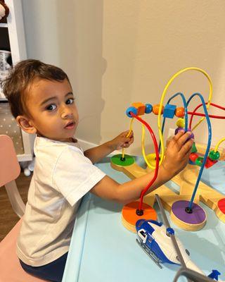 Twisting, turning, and tracking - this bead maze keeps little hands busy and builds important motor skills!