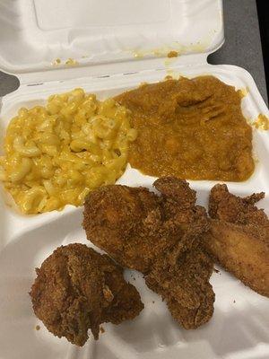 Fried chicken, yams and mac & cheese.