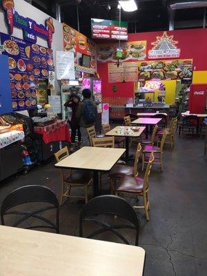 One corner of the Mercado. 3 food stalls are pictured here, there are a total of 7.