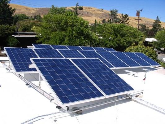 Tilt-ups used on a flat roof in San Rafael to maximize energy production.