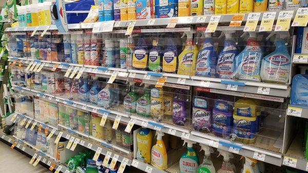 Household cleaning supplies locked behind cases.