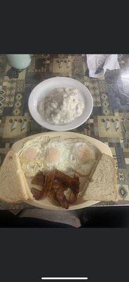 Bacon and eggs with a side of biscuits and gravy