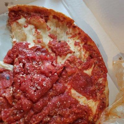 Limited sauce on deep-dish pepperoni. Pizza should fully be covered with the sauce.