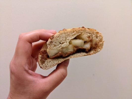 A peek inside the Apple Pie Bread - loaded with apple chunks and sweet cinnamon.