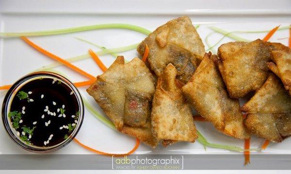 VEGETABLE SAMOSA Potatoes, peas, onions, carrots and corn with garlic, cilantro, red chili powder, turmeric, ginger and corriander, wrapped