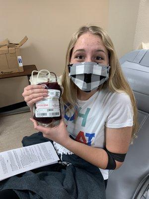 Do you see how happy she is to hold a bag of blood?