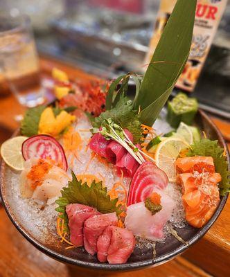 Sashimi platter with sweet shrimp, otoro, bluefin, premium uni, hamachi, and salmon prepared by our talented sushi chef.