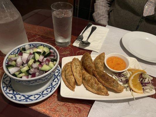 Cucumber salad and vegetable dumplings