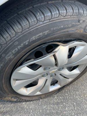 That was the damage. Purchased my own rim and they replaced not only that tire but three others, one that was under warranty for free.