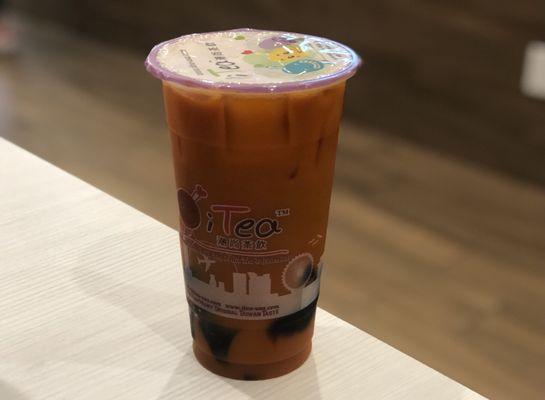 Thai iced tea with almond milk and grass jelly