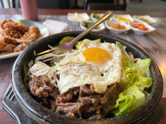 Hot pot with Beef Bulgogi and sunnyside egg.