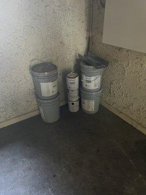 Paint buckets that have been here six months.