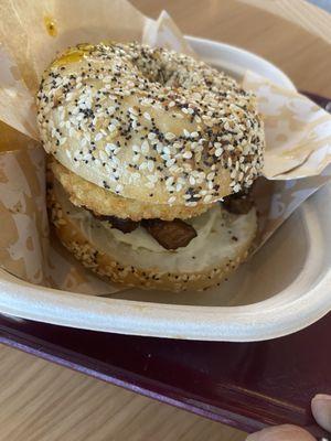 Everything Bagel Sammie: everything bagel, fried eggs, hash brown, cream cheese and brisket.