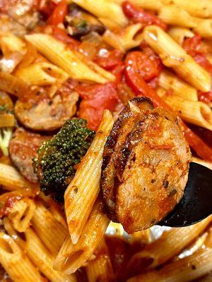 Hot sausage and broccoli pasta (lunch)-sautéed hot sausage, hot pepper flakes, roasted red peppers in a tomato sauce