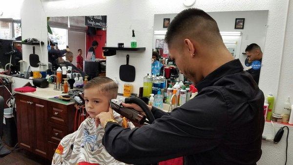 Little gentleman Alexander and his barber Jensen getting that fresh cut!