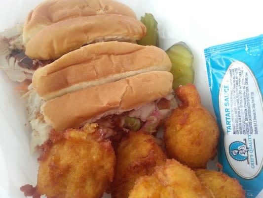 A smoked meat masterpiece. Turkey sliders with hush puppies.