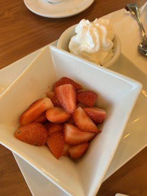 Side of strawberries and whipped cream for the French toast so you can make it as you wish!