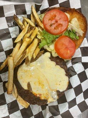 Half pound of burger fries lettuce tomatoes onions and pickles and cheese cheese